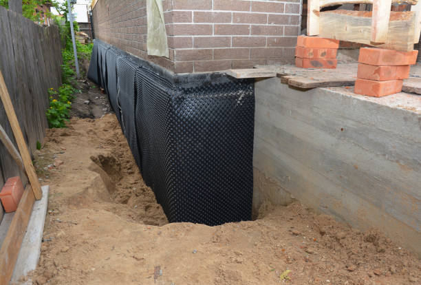 SJ Waterproofing Pros technician performing targeted Exterior Waterproofing assessment in Glendale Heights, IL
